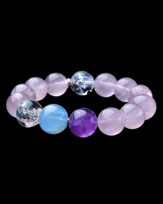 Elegant healing crystal bracelet featuring Rose Quartz, Amethyst, and White Quartz, promoting love, inner peace, and spiritual connection. Ideal for daily wear.