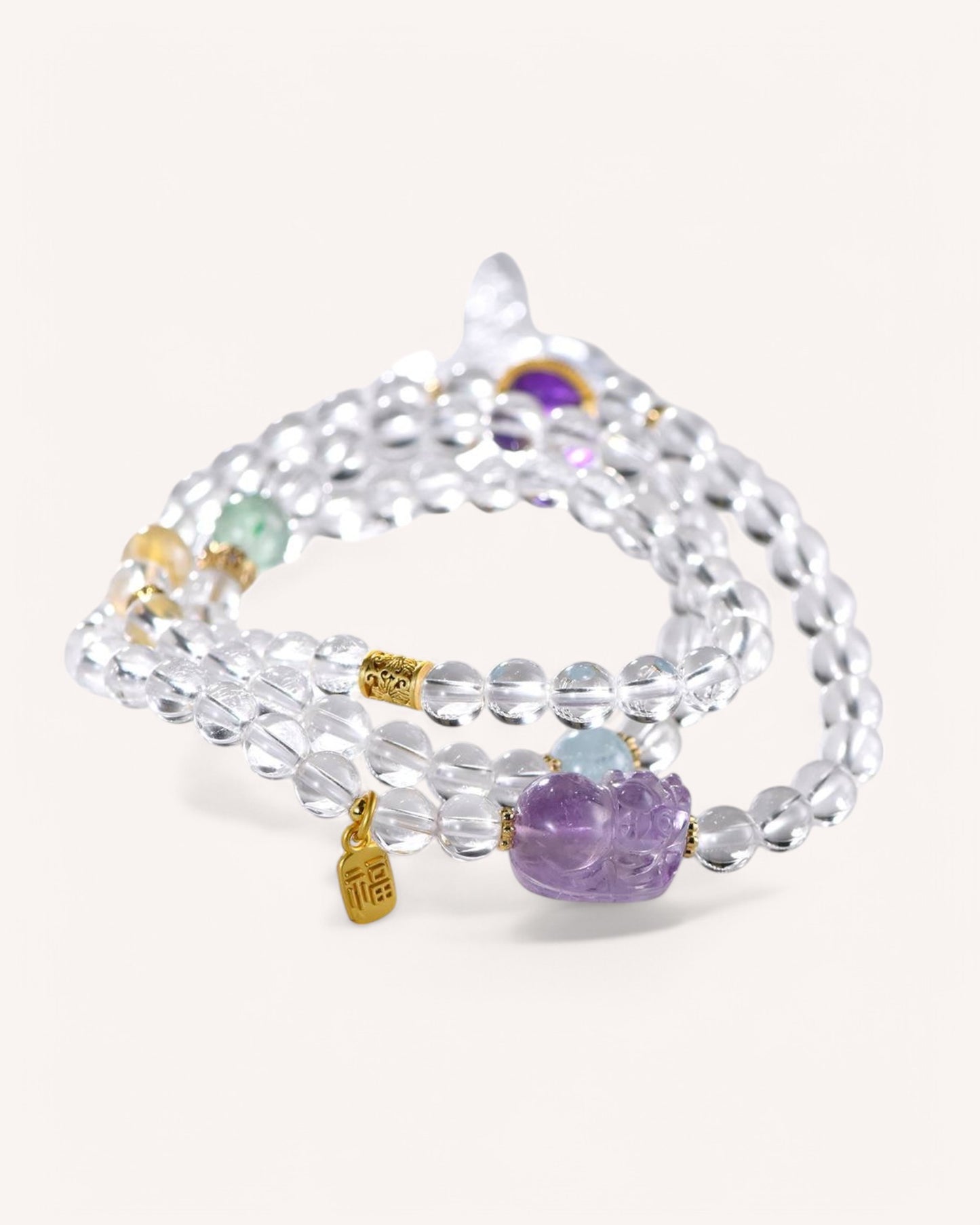 Elegant White Quartz multi-layer bracelet adorned with Rutilated Quartz, Amethyst, and Aquamarine for spiritual alignment, energy purification, and prosperity attraction.