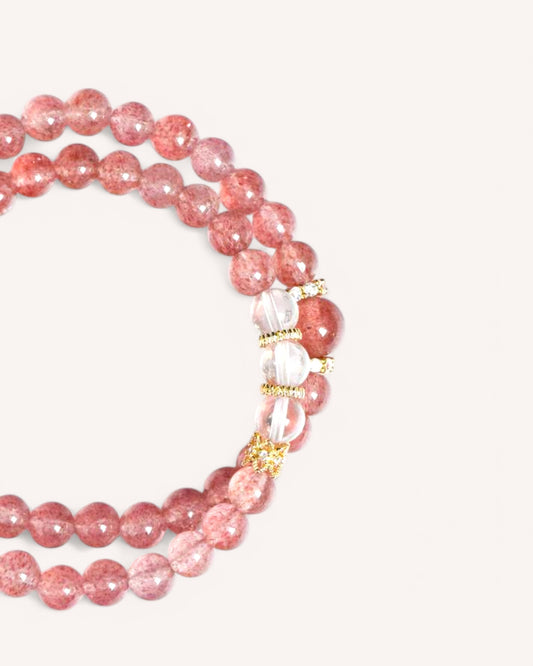 Layered Strawberry Quartz and White Quartz healing crystal bracelet with gold accents for emotional balance