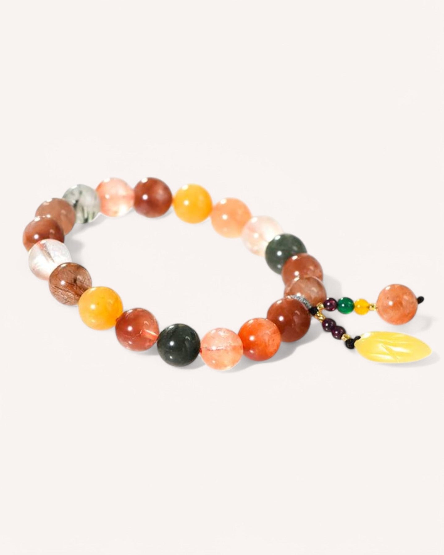 Flat layout of Amber and Longevity Quartz bracelet offering vitality, emotional healing, and balance