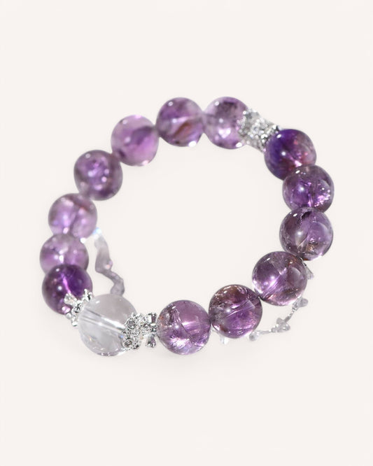 Side view of Amethyst and Clear Quartz Healing Bracelet, designed for emotional stability, mental clarity, and shielding against negative energy.