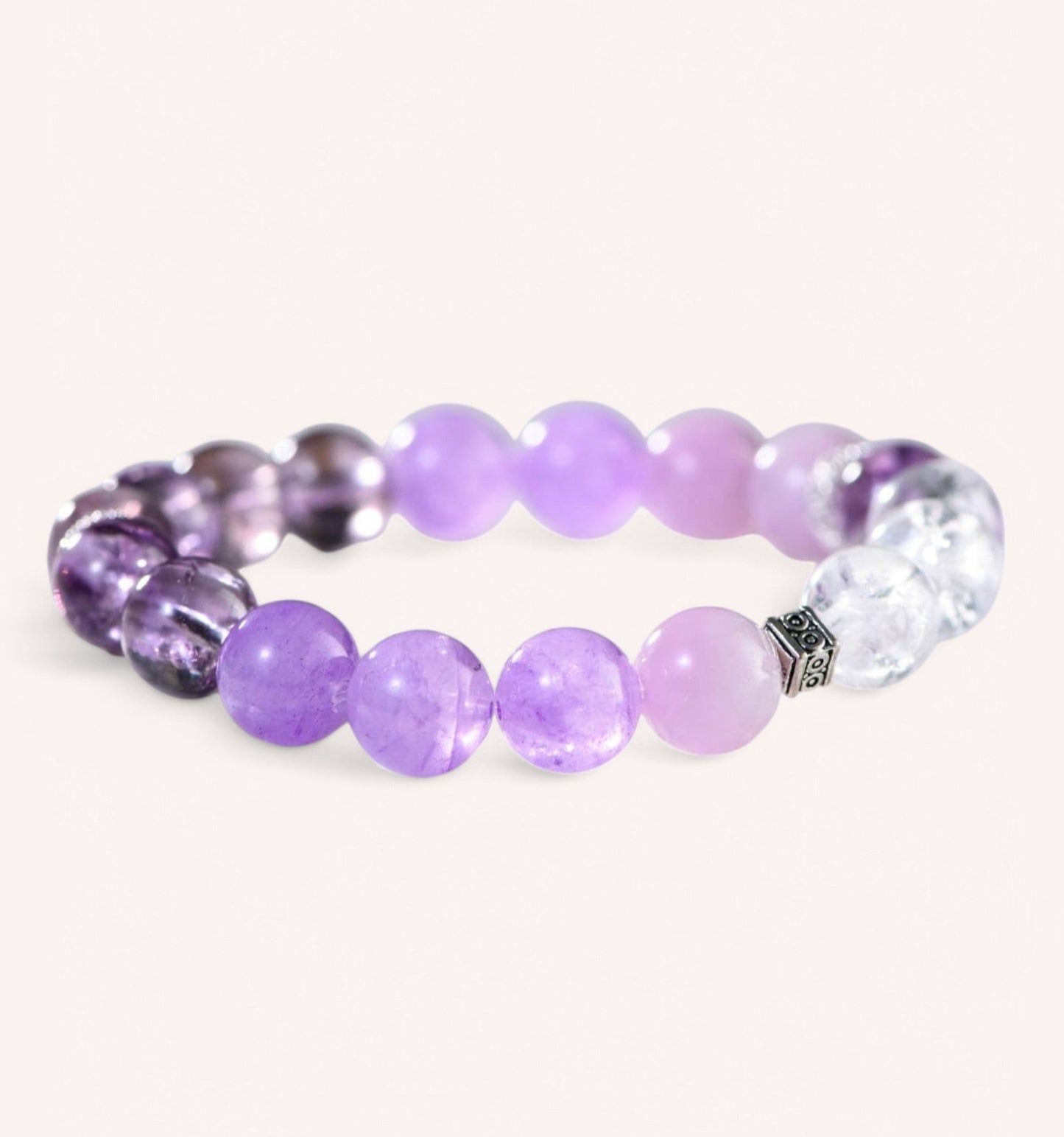 Side view of the Amethyst, Kunzite & White Quartz Balance Bracelet, showcasing its energy-purifying and calming gemstone combination.