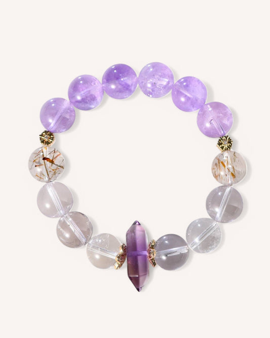 Front view of the Transformation & Growth Amethyst & Rutilated Quartz Bracelet, featuring lavender amethyst, rutilated quartz, and white quartz for spiritual clarity and energy balance.