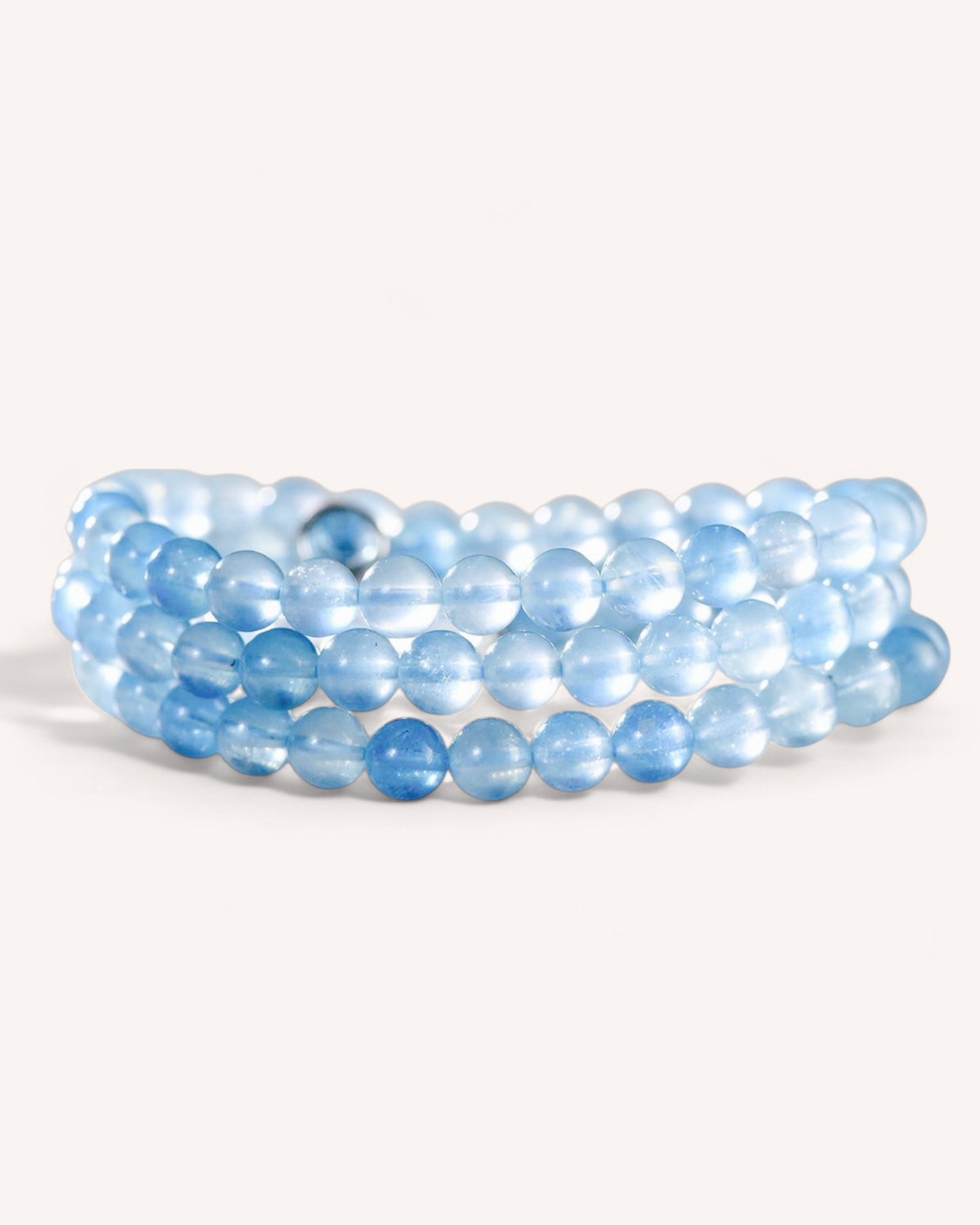 Triple wrap aquamarine crystal bracelet designed for emotional calm and inner clarity