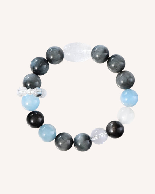 Women’s emotional healing bracelet made with Aquamarine and White Quartz, enhancing love, balance, and emotional clarity.