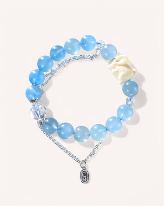 Healing aquamarine and white quartz bracelet with ivory rabbit charm and S925 silver for luck and clarity.