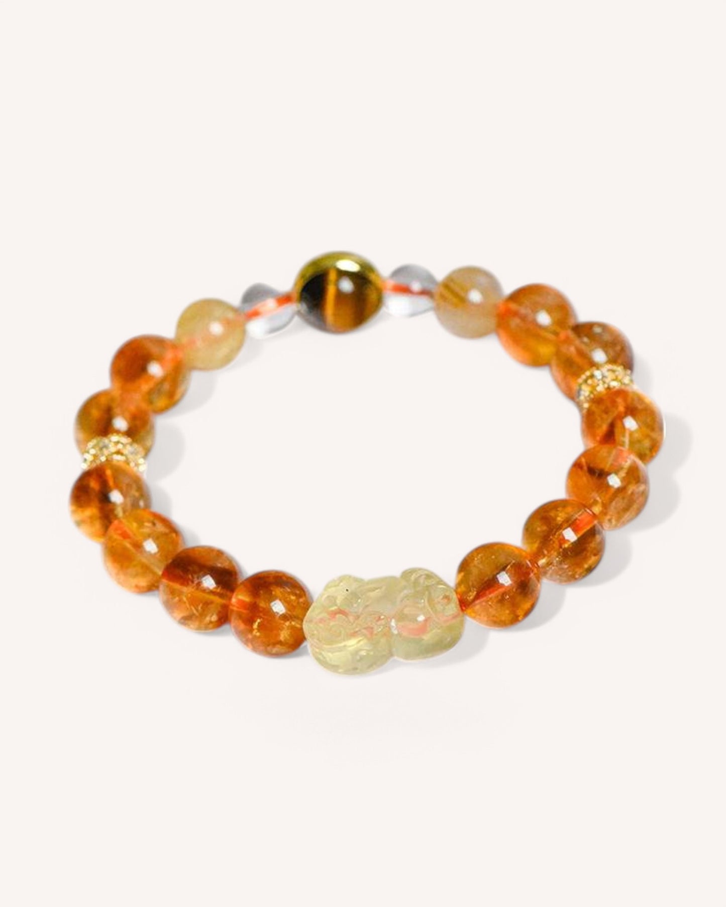 Citrine, Golden Tiger Eye & White Quartz Bracelet with Alloy Accent – A handcrafted energy bracelet designed to enhance confidence, attract prosperity, and promote mental clarity. Features high-quality citrine for wealth, tiger eye for courage, and white quartz for balance and energy cleansing.
