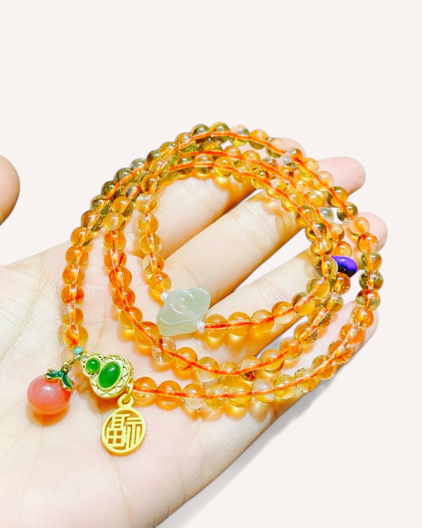 Hand wearing Citrine & Hetian Jade Multi-Layer Bracelet – Wealth, Balance & Spiritual Protection