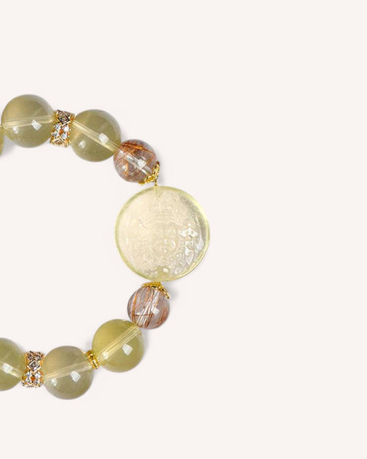 Citrine, Tiger Eye & Rutilated Quartz Bracelet – A handcrafted crystal bracelet designed for wealth, protection, and confidence. Citrine attracts prosperity, Tiger Eye enhances decision-making, and Rutilated Quartz amplifies energy and shields against negativity.