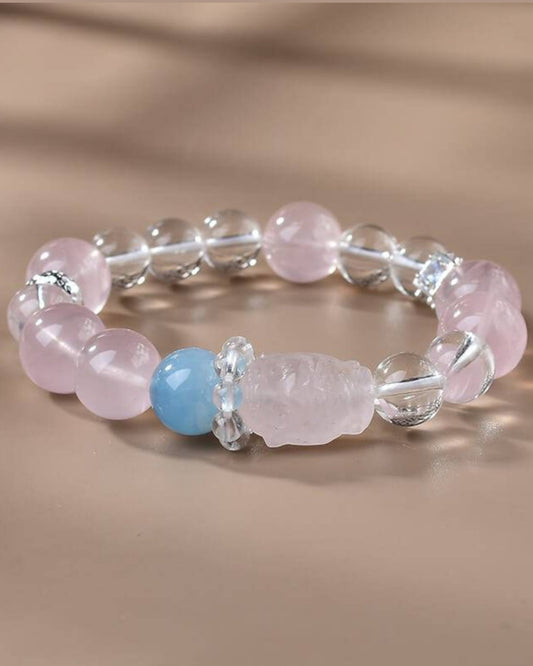 Side view of Rose Quartz, Aquamarine and White Quartz bracelet enhancing love, peace and intuition
