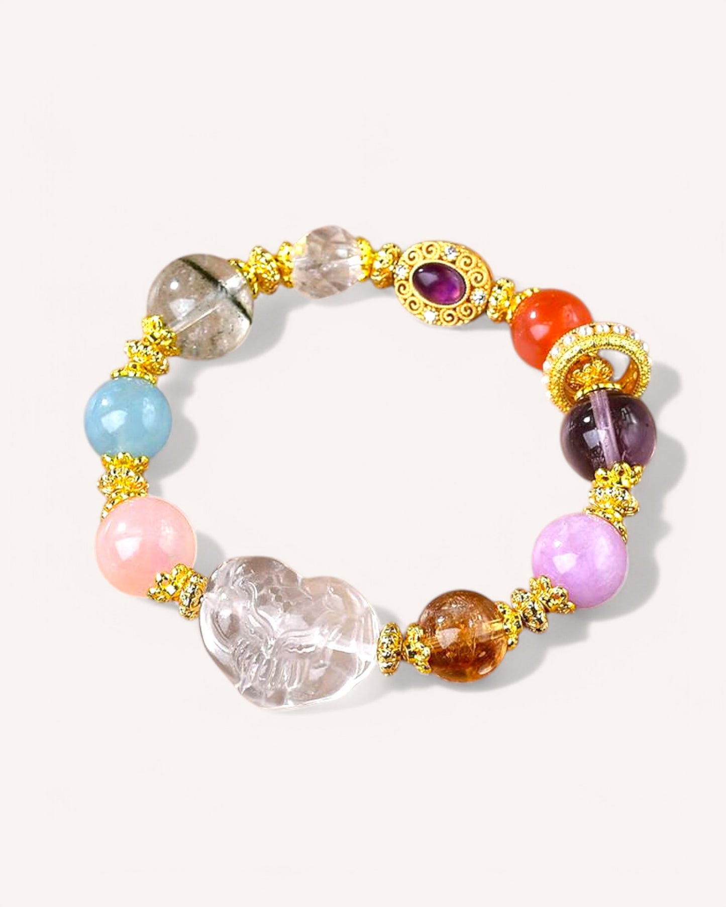 White Quartz crystal bracelet with Pink Quartz and Aquamarine beads for emotional balance and spiritual clarity.