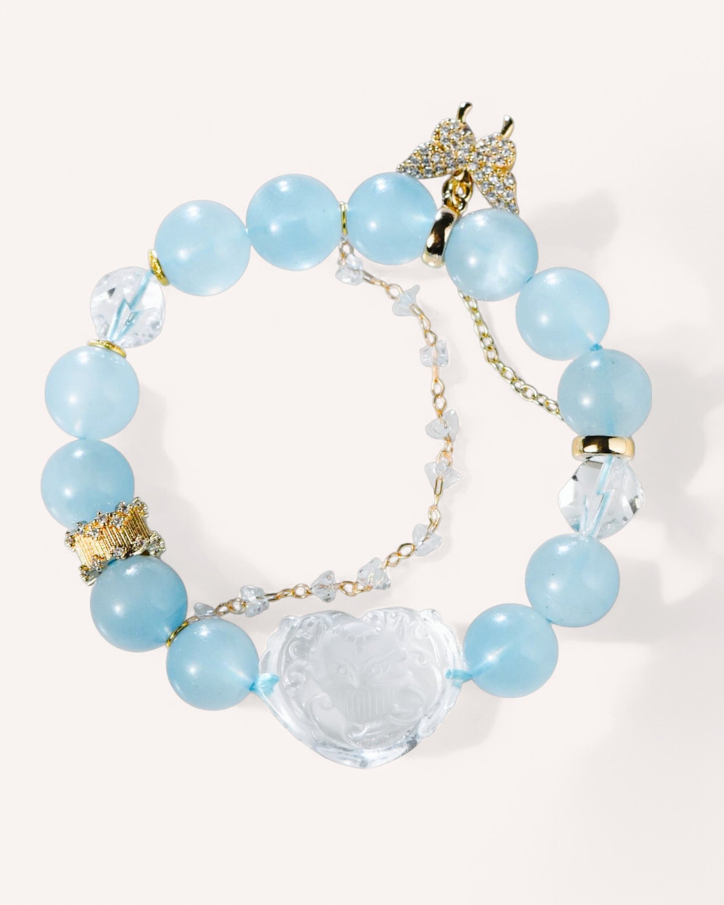 Aquamarine and white quartz bracelet with carved Nine-Tailed Fox symbol for emotional healing and protection