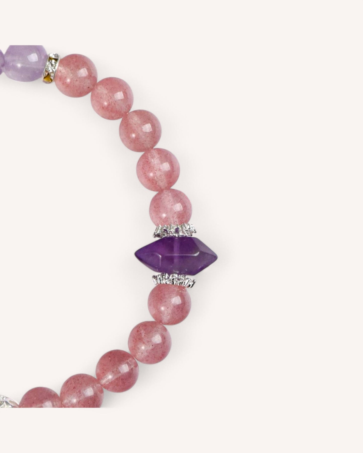 Close-up of Amethyst and Strawberry Quartz healing bracelet, featuring a deep purple Amethyst focal stone for clarity, intuition, and heart-mind harmony.