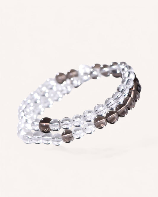 A multi-layer Smoky Quartz and White Quartz bracelet designed for energy balance, stress relief, and emotional grounding. Ideal for meditation and daily wear.