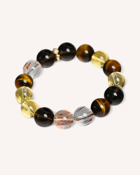 Close-up of Golden Tiger Eye, Citrine & Smoky Quartz Bracelet – Showcasing premium natural crystals with black gold obsidian for energy protection. Perfect for manifestation, success, and emotional resilience.