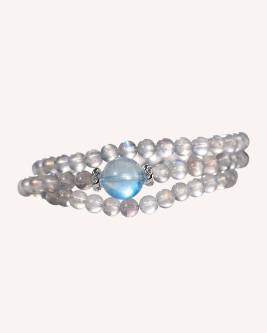 Gray Moonstone and Aquamarine multi-layer bracelet displayed from side view for spiritual meditation and emotional healing
