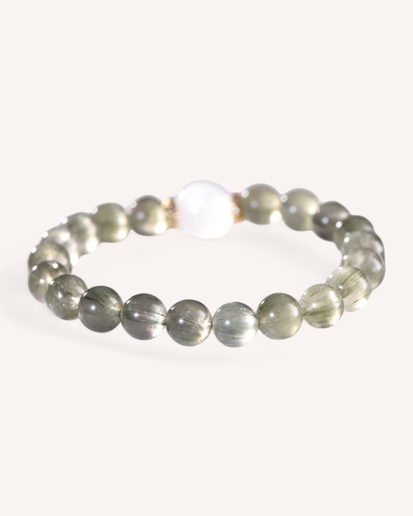 Crystal healing bracelet made with Green Rutilated Quartz and Moonstone beads