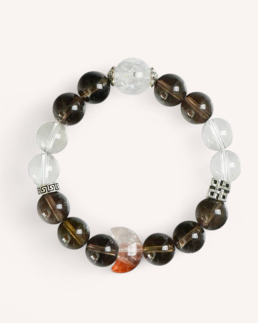 Front view of Grounding & Vitality Smoky Quartz & Red Hematoid Quartz Bracelet showing the balance of dark smoky quartz and clear white quartz beads.