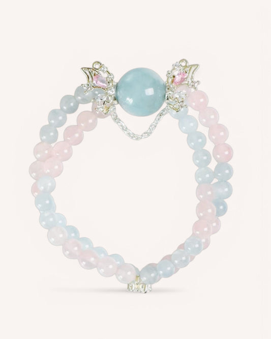 Front view of the Healing Aquamarine & Rose Quartz Butterfly Bracelet, showcasing double-layered pastel gemstone beads and symbolic butterfly accents.