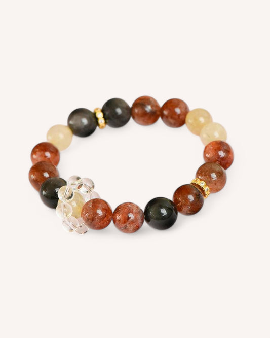 Side angle of powerful healing bracelet with Obsidian, Super Seven, and Rutilated Quartz—designed for manifestation, protection, and chakra alignment.
