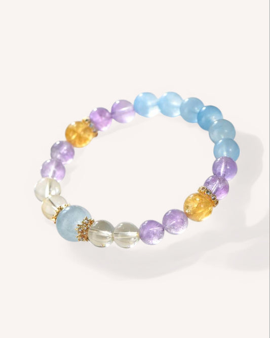 Side angle of spiritual healing bracelet with Aquamarine, Amethyst, and Azeztulite beads for energy flow and balance