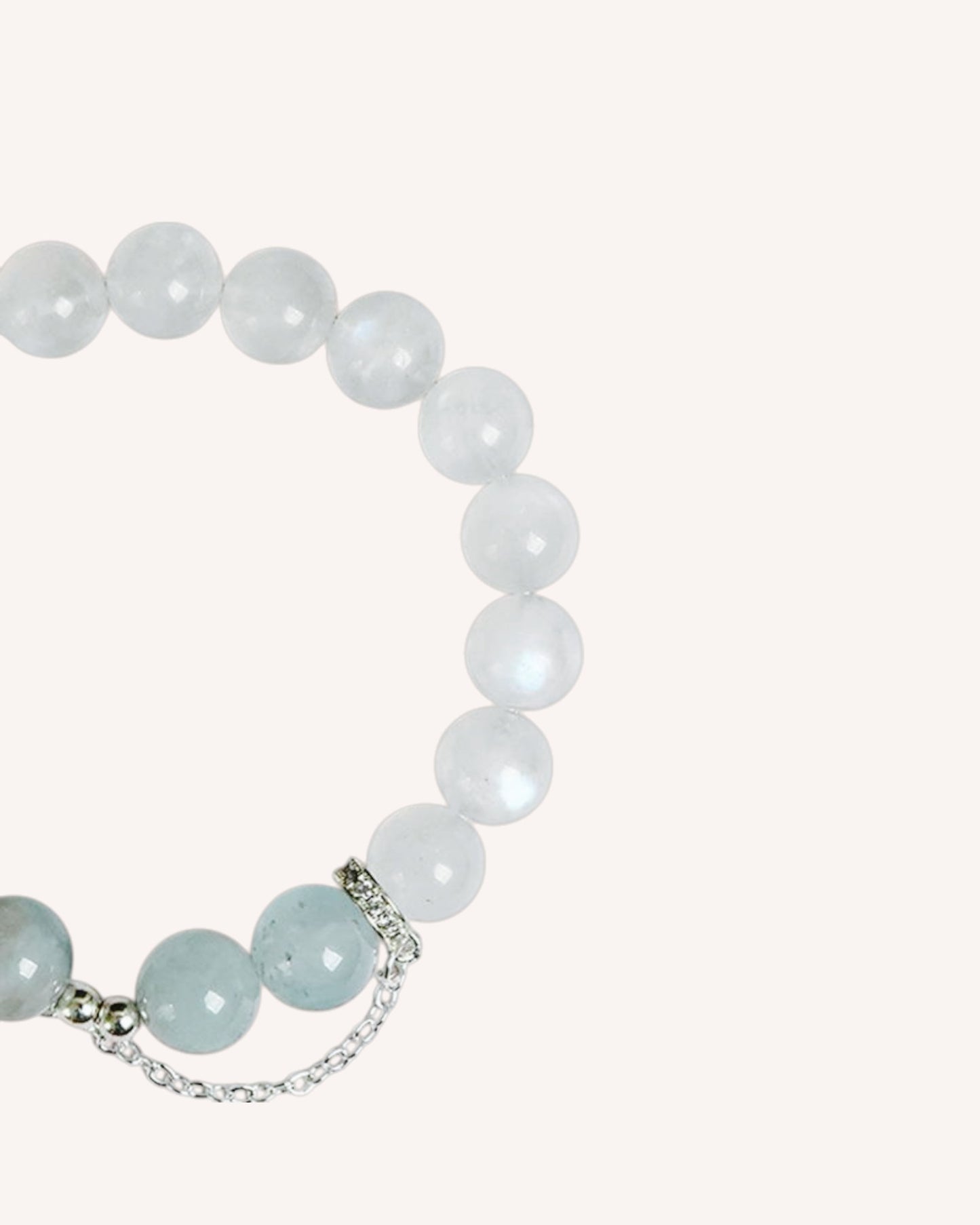 Side angle of calming Moonstone and Aquamarine bracelet, designed for intuition and serenity.