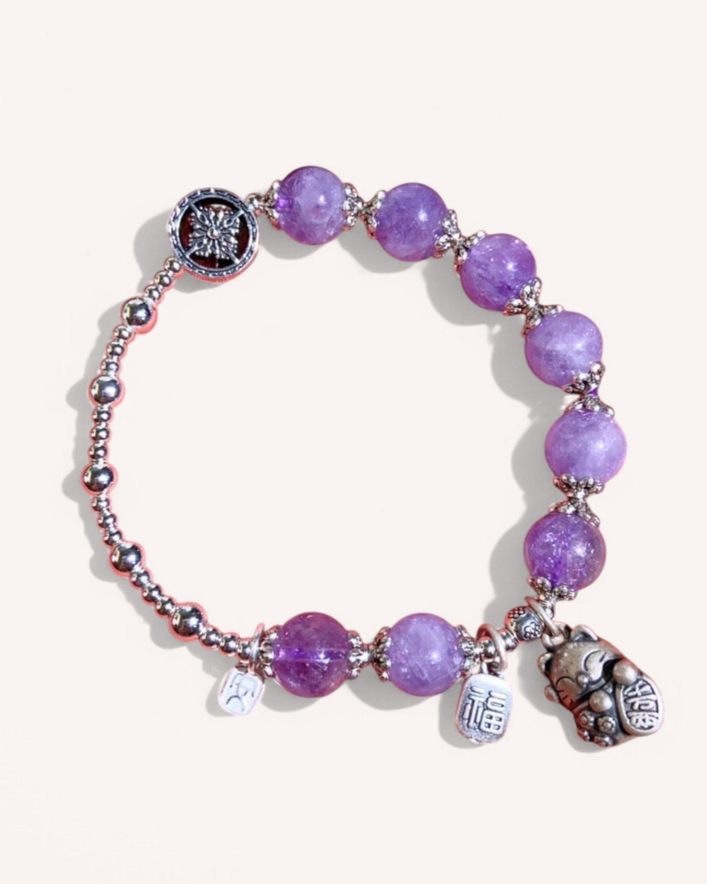 Front view of the Lavender Amethyst Fortune Cat Bracelet, featuring spiritual healing crystals and a lucky Maneki Neko charm for protection and prosperity.