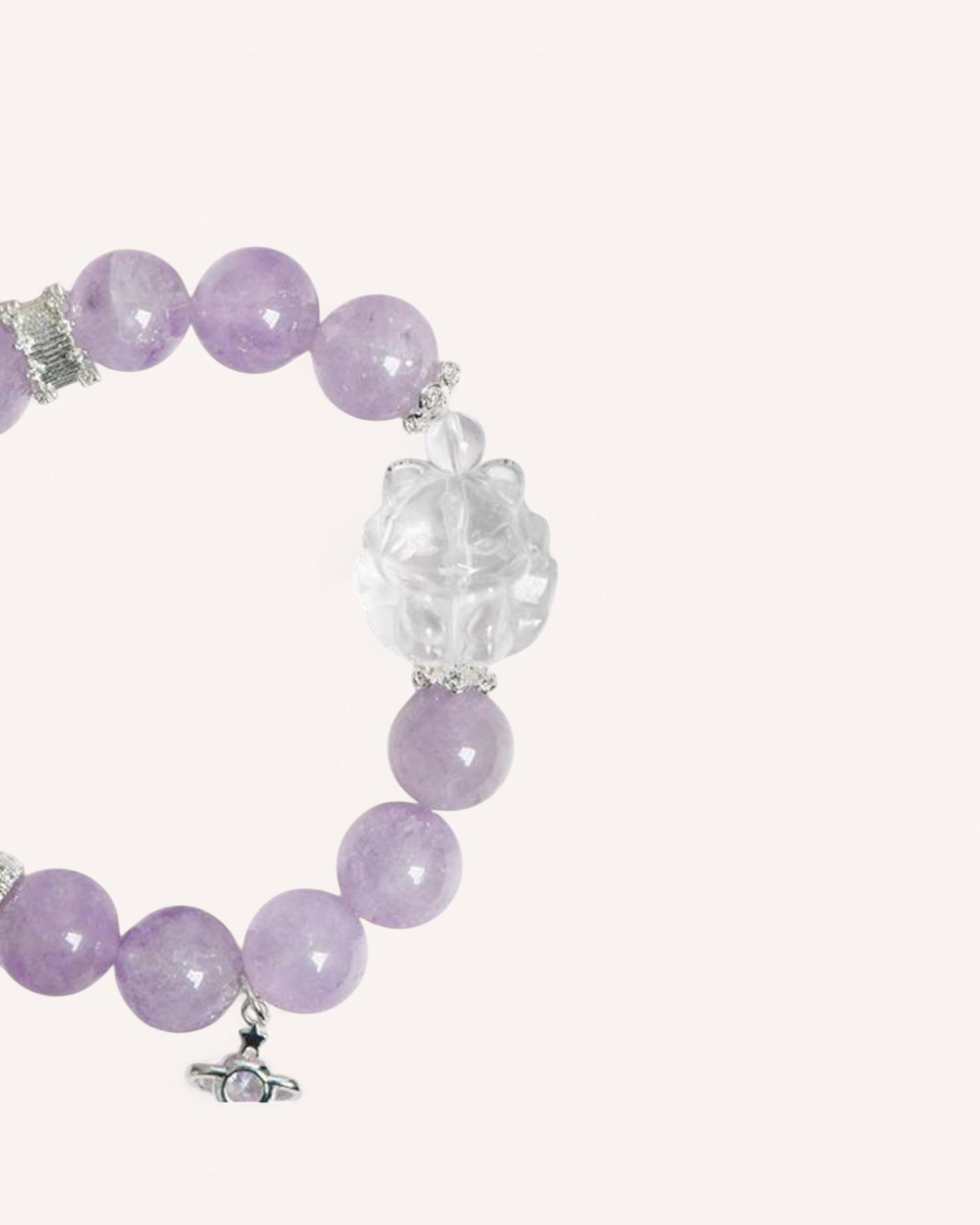 Close-up of the Lavender Amethyst Fox Bracelet, highlighting the intricate details of the hand-carved white quartz fox charm and the elegant alloy accents, perfect for energy cleansing and emotional balance.