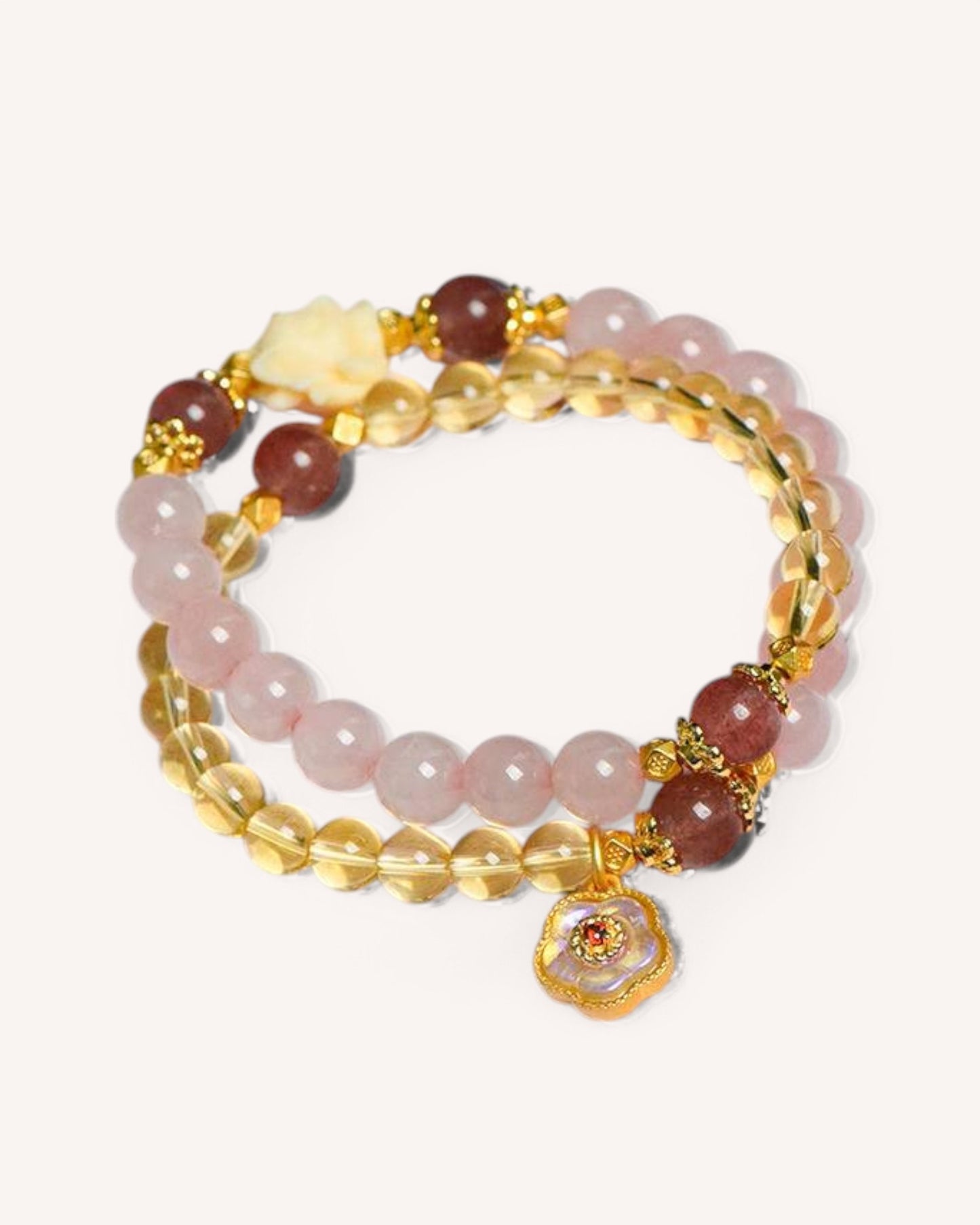 Elegant healing bracelet featuring Rose Quartz, Citrine & Strawberry Quartz with gold accents for attracting love, joy & success.