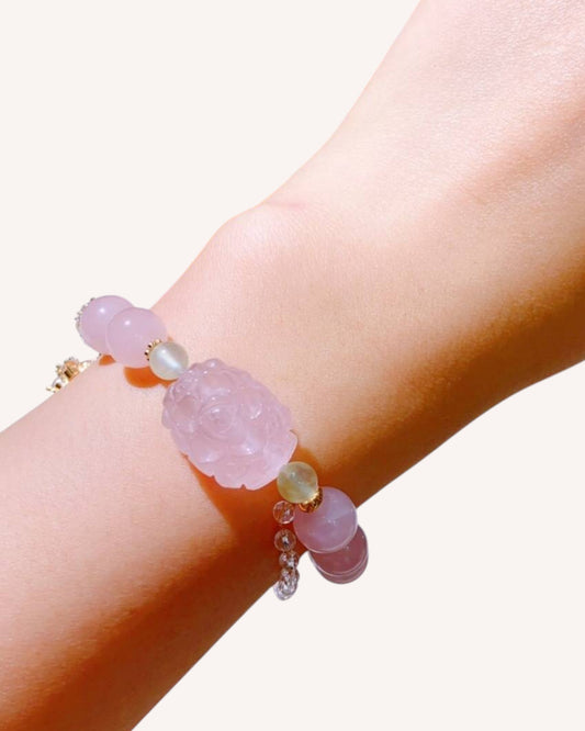Model wearing Rose Quartz and White Quartz bracelet with Prehnite and fox charm for love, balance, and emotional clarity.