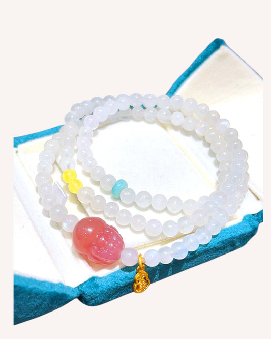 Multilayer healing bracelet with Moonstone, Amber, and Sea Jasper in gift box, designed for protection and emotional healing