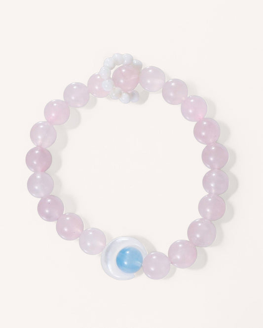 Top view of Rose Quartz, Aquamarine, and Mother of Pearl crystal bracelet for love, clarity, and serenity.