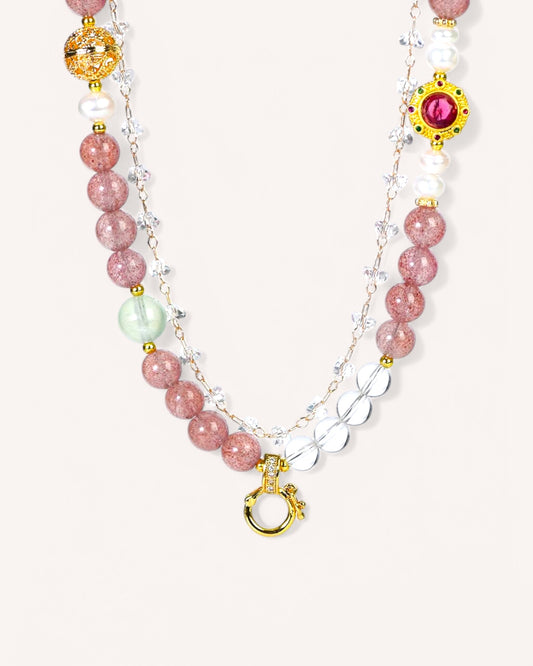 Versatile healing crystal jewelry chain worn as bracelet or necklace, made with Strawberry Quartz, White Quartz, and pearls.