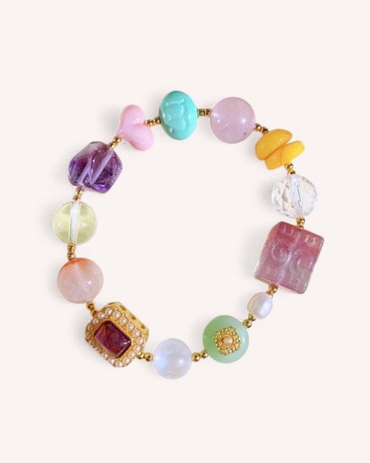 Natural gemstone bracelet featuring Tourmaline, Amethyst, and Turquoise for love, wisdom, and emotional stability