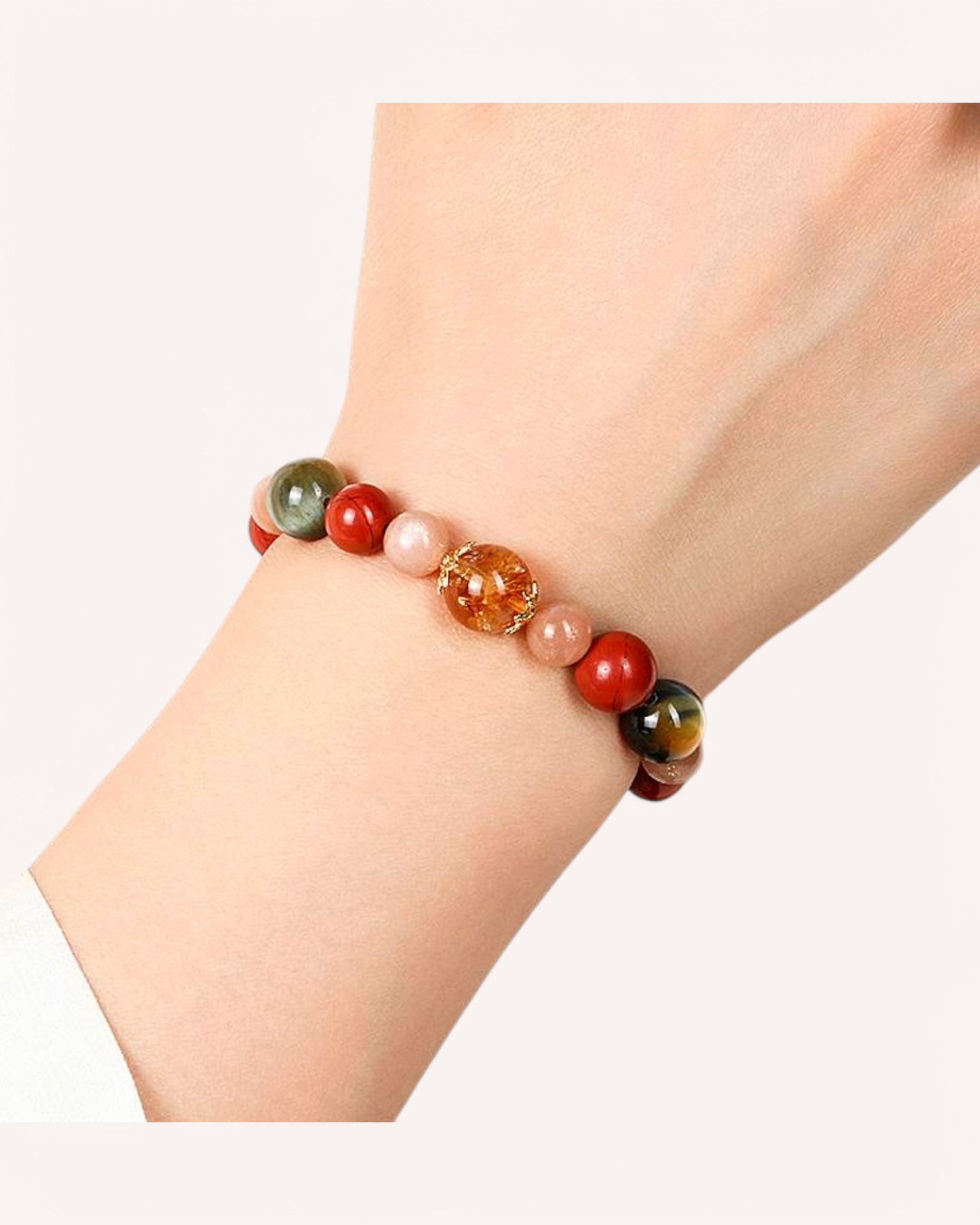 Model wearing Obsidian and Citrine bracelet for emotional stability, protection and abundance
