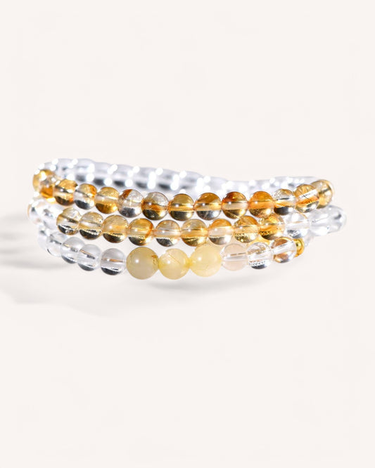 Elegant prosperity-boosting bracelet featuring Golden Rutilated Quartz and White Quartz, perfect for attracting success, motivation, and positive energy flow.