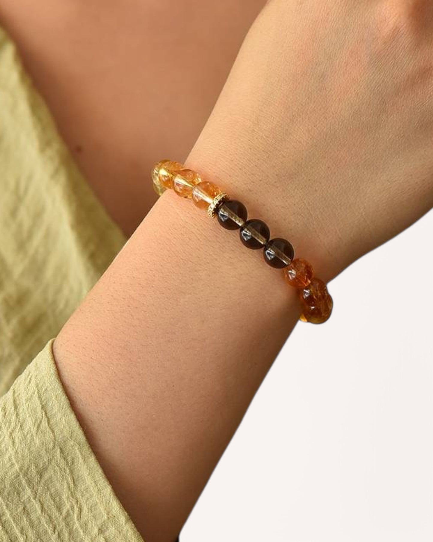 Model wearing the Prosperity & Grounding Citrine Smoky Quartz Bracelet to attract abundance, confidence, and balance.