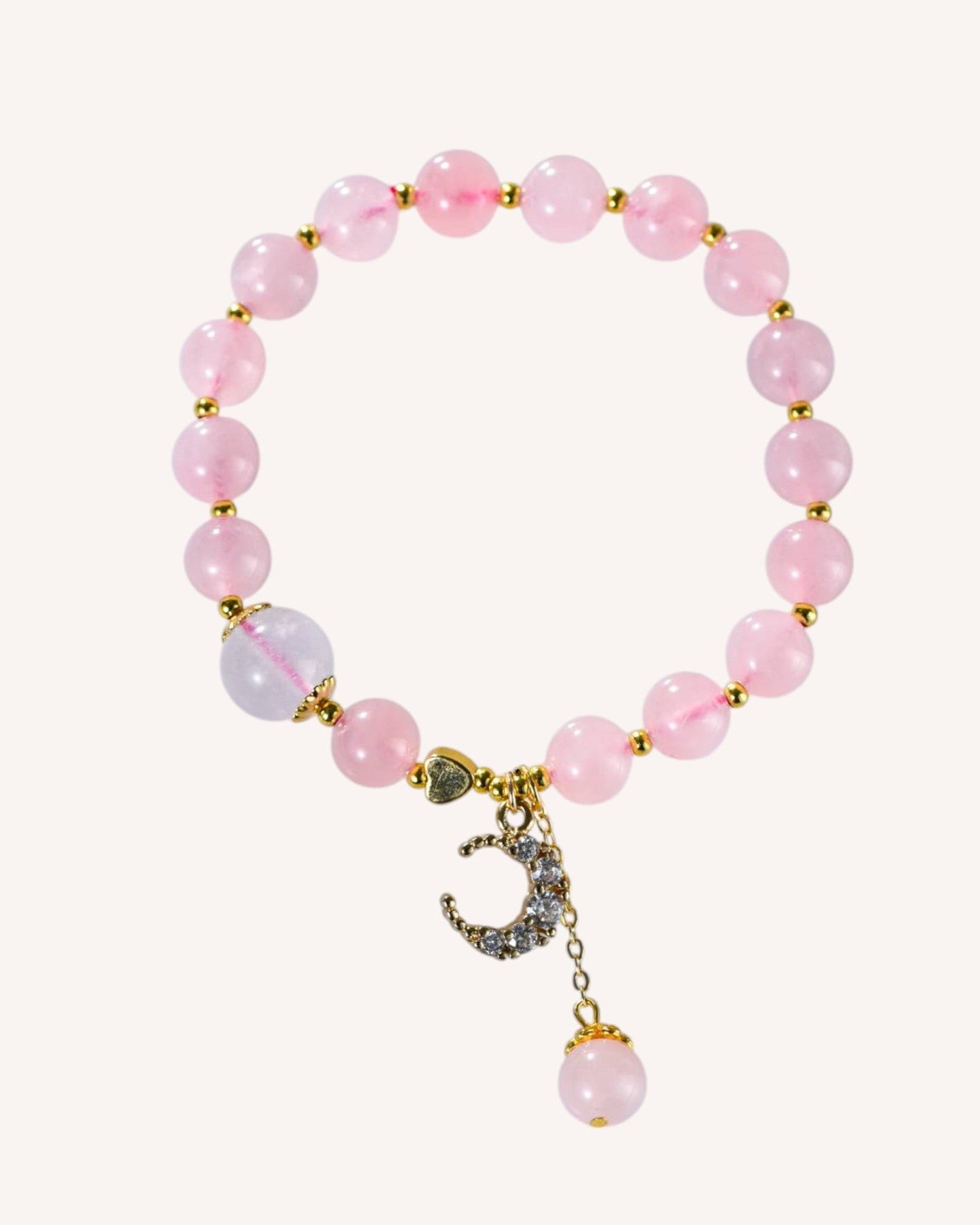 Rose Quartz bracelet with moon charm for emotional healing and love energy