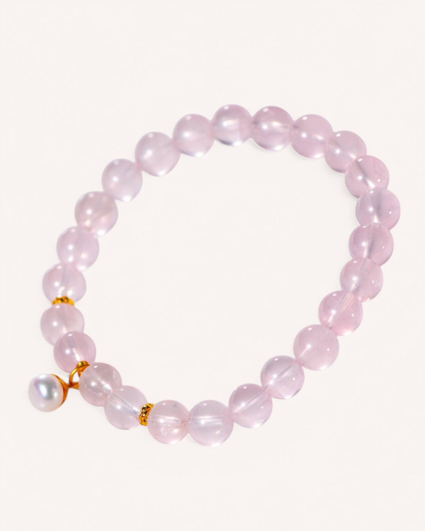 Elegant Rose Quartz and Pearl bracelet promoting inner peace and feminine energy