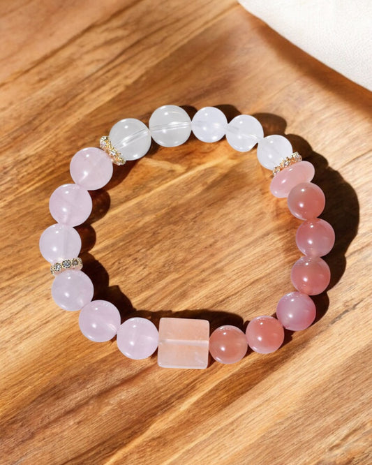 Natural light photo of Pink Phantom and Morganite crystal bracelet, designed to promote self-love, positivity, and abundance.