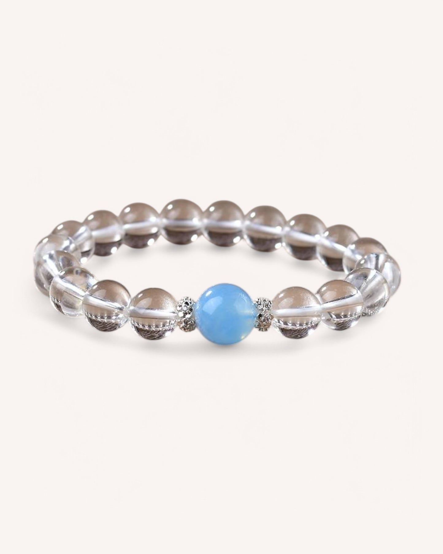 Serenity & Communication Aquamarine & White Quartz Bracelet featuring a calming aquamarine bead and energy-balancing white quartz.