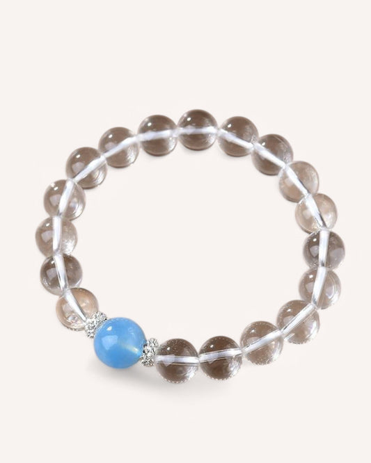 A close-up side view of the Aquamarine & White Quartz Bracelet, designed for stress relief, clarity, and emotional balance.