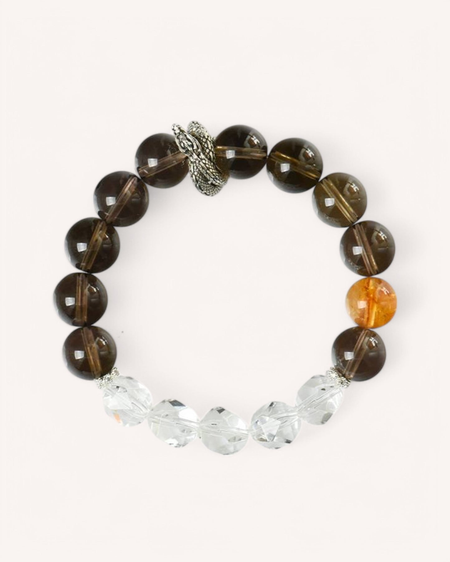 Front view of the Strength & Abundance bracelet made with Smoky Quartz, Citrine, and White Quartz, designed for prosperity, grounding, and clarity.