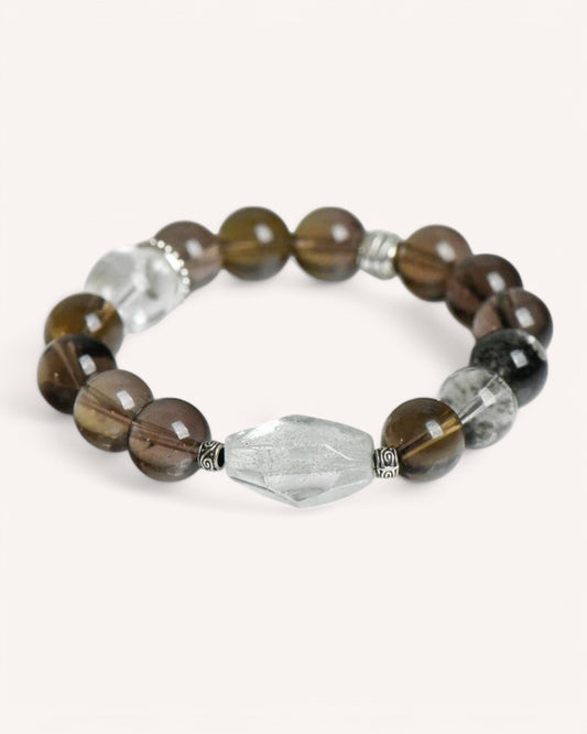 Side angle of grounding and intuition crystal bracelet made with Smoky Quartz and White Quartz
