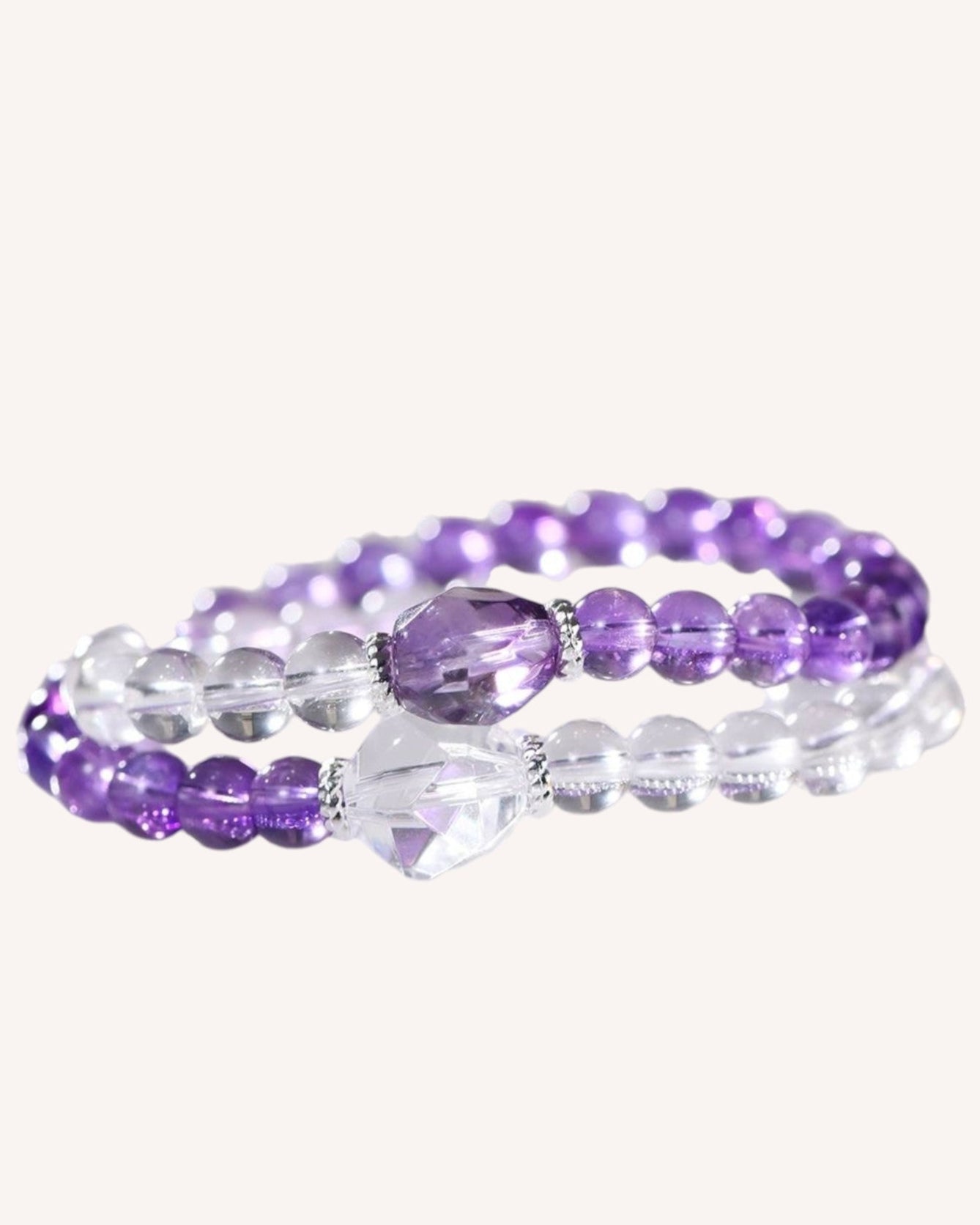 A beautiful Amethyst & White Quartz wrap bracelet, designed for spiritual balance, emotional healing, and mental clarity. Features a dual-layer beaded design.