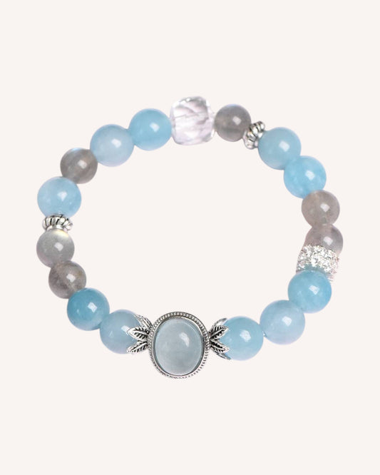 Side view of crystal bracelet made with Aquamarine, Gray Moonstone, and White Quartz for spiritual awareness
