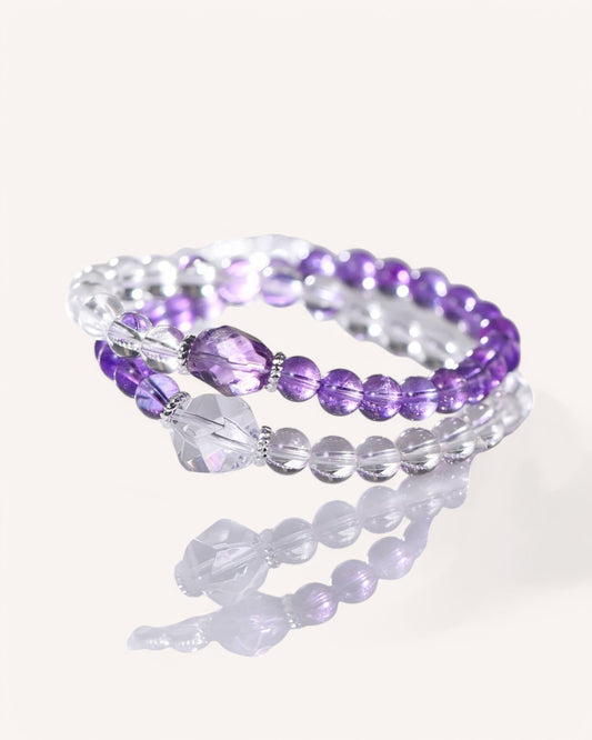 A double-layer Amethyst & White Quartz bracelet, ideal for stress relief, mental clarity, and spiritual awareness. Featuring a unique sugar cube amethyst stone.