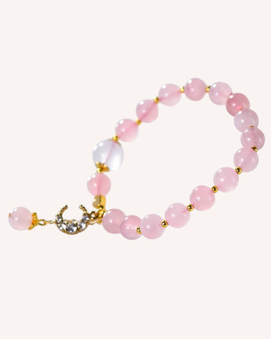 Elegant rose quartz bracelet with moon pendant for love, intuition and balance