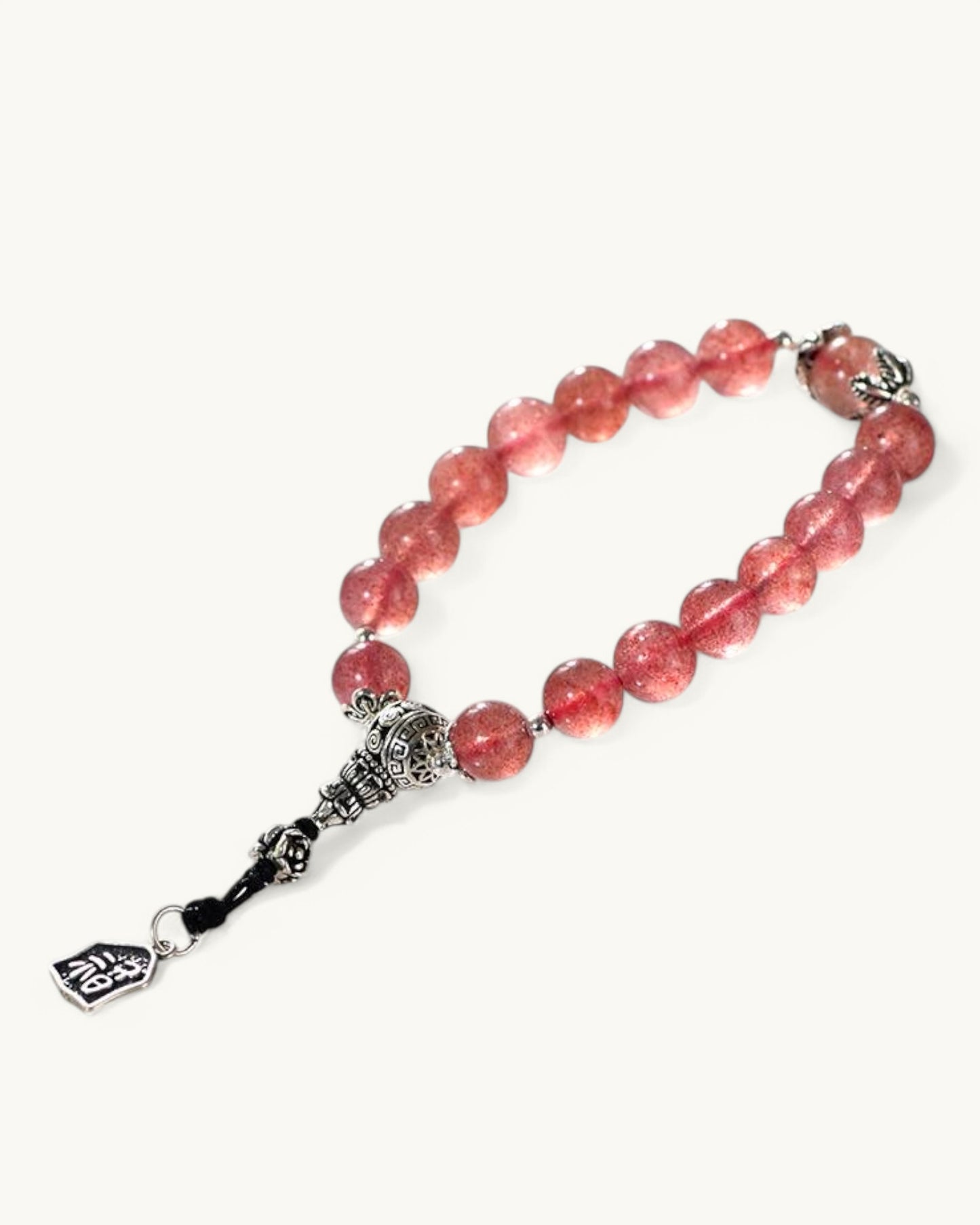 Strawberry Quartz bracelet with detailed silver dragon charm for strength and protection