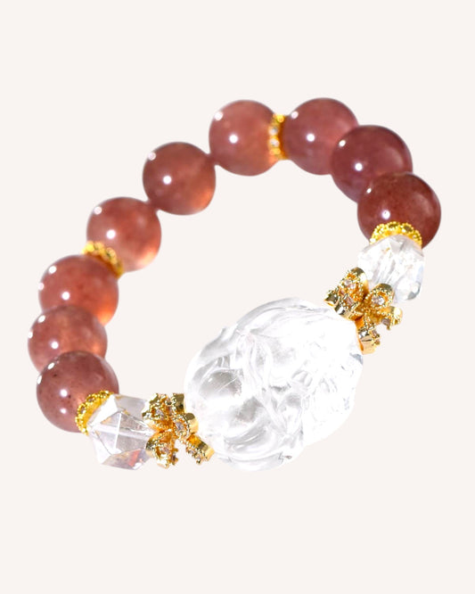 Side angle of Strawberry Quartz bracelet featuring White Quartz Nine-Tailed Fox charm, symbolizing emotional healing and attraction.